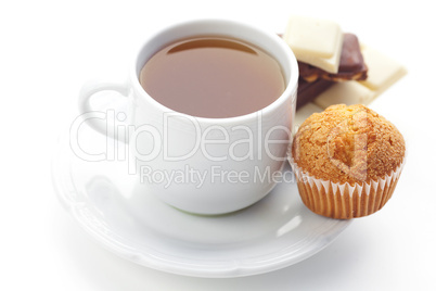 bar of chocolate,tea and muffin isolated on white