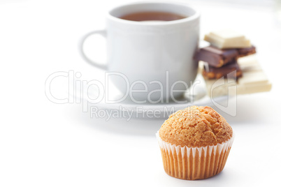 bar of chocolate,tea and muffin isolated on white