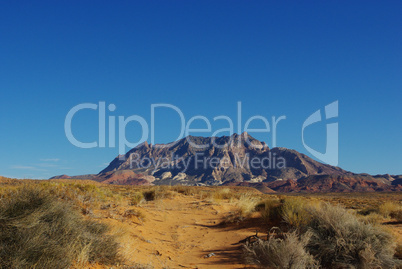 Sand, mountains and blue sky, Glen Canyon National Recreation Area, Utah