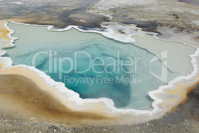 Green pool deep into earth, Yellowstone National Park, Wyoming