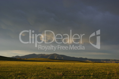 Prairie, mountains and clouds in the evening, Montana