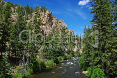 River, forest, rocks and blue sky, Colorado