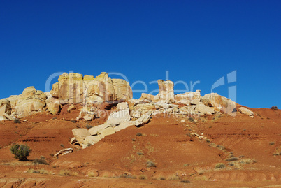 Red and white rocks under intense blue sky, Utah