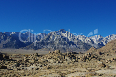 Alabama Hills and Sierra Nevada under blue sky, California