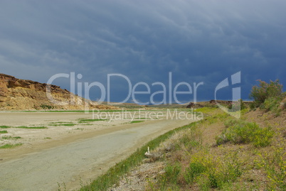 Dry River bed, sun and clouds, Montana