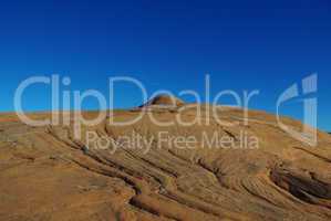 Layered rock under blue sky, Grand Stair Escalante National Monument, Utah