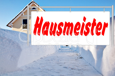 Advertising sign in front of house in winter