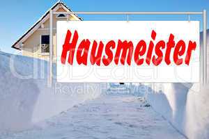 Advertising sign in front of house in winter