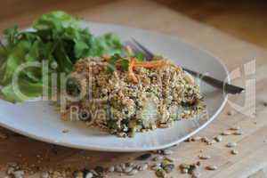 Vegetarian crumble served with salad
