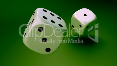 white dice at green background closeup