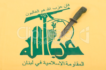 Army knife and flag of Hezbollah