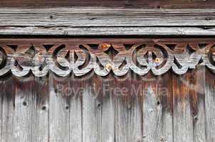 Fragment of old wooden ornament