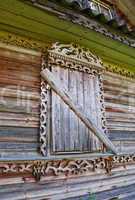 Old wooden window with ornament