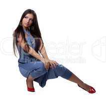 Beautiful young woman in overalls