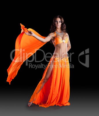 Oriental dancer in orange dress