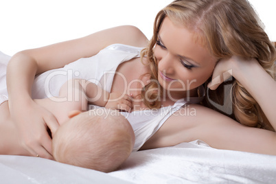 Happy mother with a baby