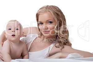 Mother with baby in bed