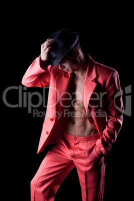 Sexy man in red suit