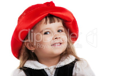 Child in Little Red Riding Hood portrait isolated
