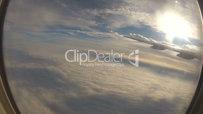 Airplane Flying over Clouds