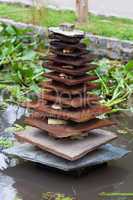 Japanese wooden pagoda in the background of green grass