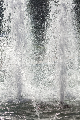 splashing water of fountain in sunlight