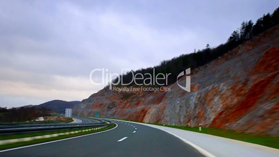 Car driving on highway before rain time lapse