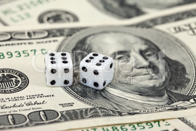 Gaming dice and money