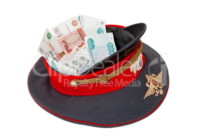 Police cap with money on  white background