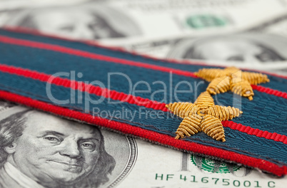 Shoulder strap of russian police on money  background