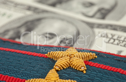 Shoulder strap of russian police on money  background