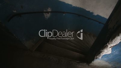 Vintage spiral stairs POV, slow motion