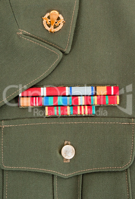 Military awards and decorations on green uniform