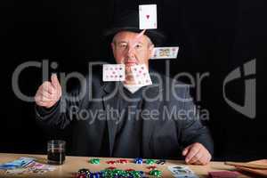 Man throws the poker cards