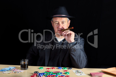 Man with a cool look at poker