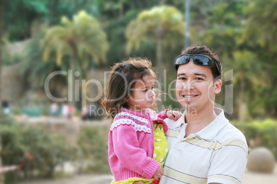 Father and daughter in park