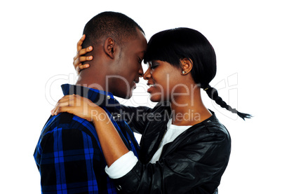 Young female about to kiss her boyfriend