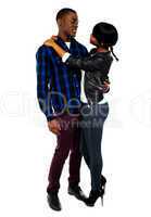 Attractive african couple hugging