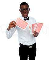 Young black boy ready to show his trump card