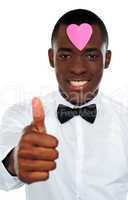 Love african boy gesturing thumbs-up