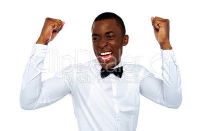 Excited african man enjoying his success