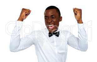 Excited african man enjoying his success