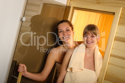 Happy women leaving sauna at wellness center