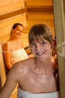 Woman posing at sauna in health spa