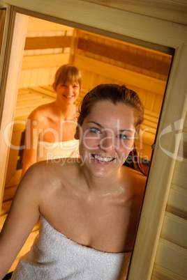 Woman posing at sauna in health spa