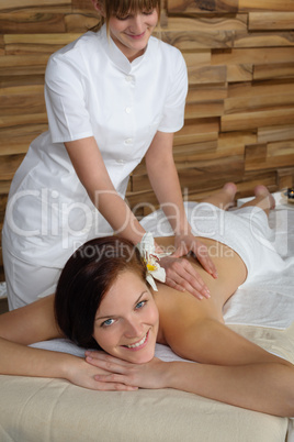 Luxury spa room woman back massage