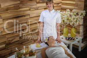Female masseur give beauty treatment luxury spa