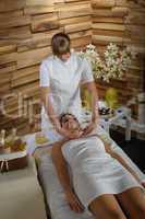 Massage treatment woman at luxury spa