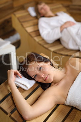Relax spa woman lying on wooden chair