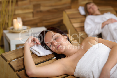 Spa room woman relax on wooden chair